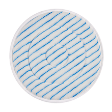The Kiehl microfiber pad by Johannes Kiehl KG is a round, white cleaning pad with blue diagonal stripes and a spiral pattern, finished with a thin white edge - ideal for professional cleaning, depicted on a plain white background.