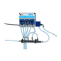 A wall-mounted Johannes Kiehl KG dosing system ARENAS-P3, consisting of three 18 L/h dosing pumps with blue dials, transparent outlet hoses, and the Kiehl logo on the top for precise liquid dosing.