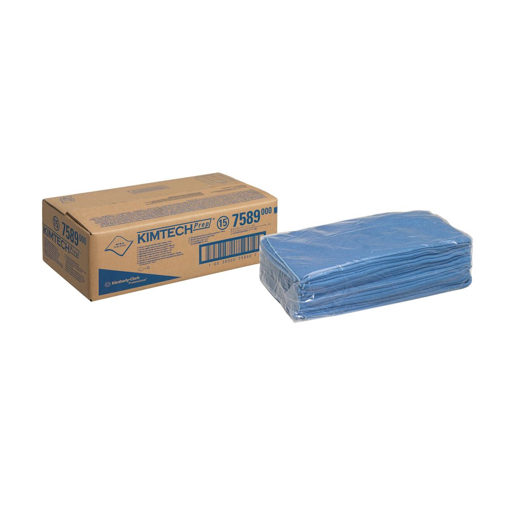 A box labeled "Kimtech® microfiber surface wipes - Blue" from Kimberly-Clark GmbH stands next to a stack of blue cleaning wipes, packaged in clear plastic and ready for effective cleaning.