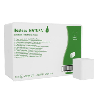 A white package with the inscription "Hostess™ NATURA Toilet Paper - Single Sheet System / White / 500" from Kimberly-Clark GmbH shows product information, a green section, an image of folded tissues, and a barcode. In front sits an eco-friendly toilet paper.