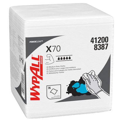 A stack of WypAll® X70 PowerClean cleaning cloths, quarter-folded, from Kimberly-Clark GmbH, in white packaging with black and red print as well as usage instructions and cleaning illustrations.
