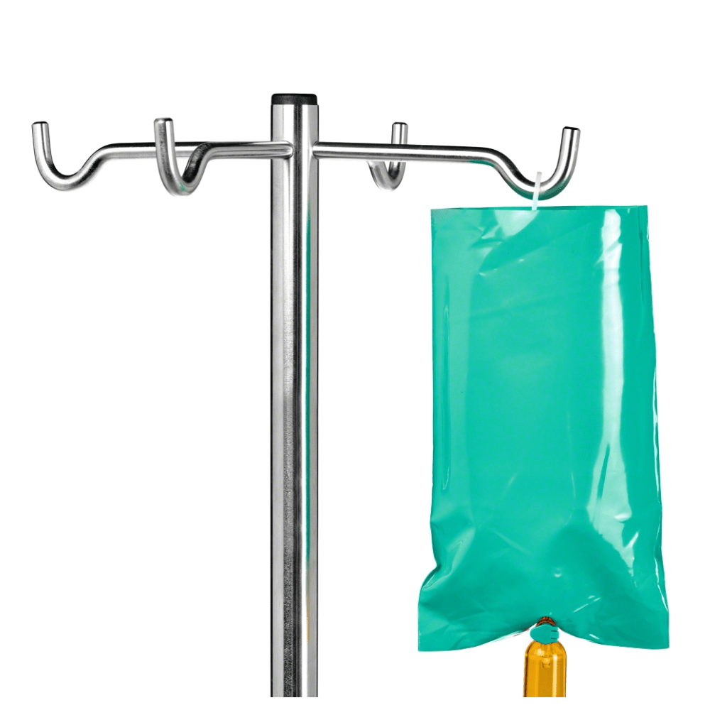 Depicted is a metal infusion stand with several hooks, one of which holds a partially visible B. Braun light protection cover for Ecoflac® plus Green Bag. The design is plain white, ideal for medical care with light-sensitive solutions.