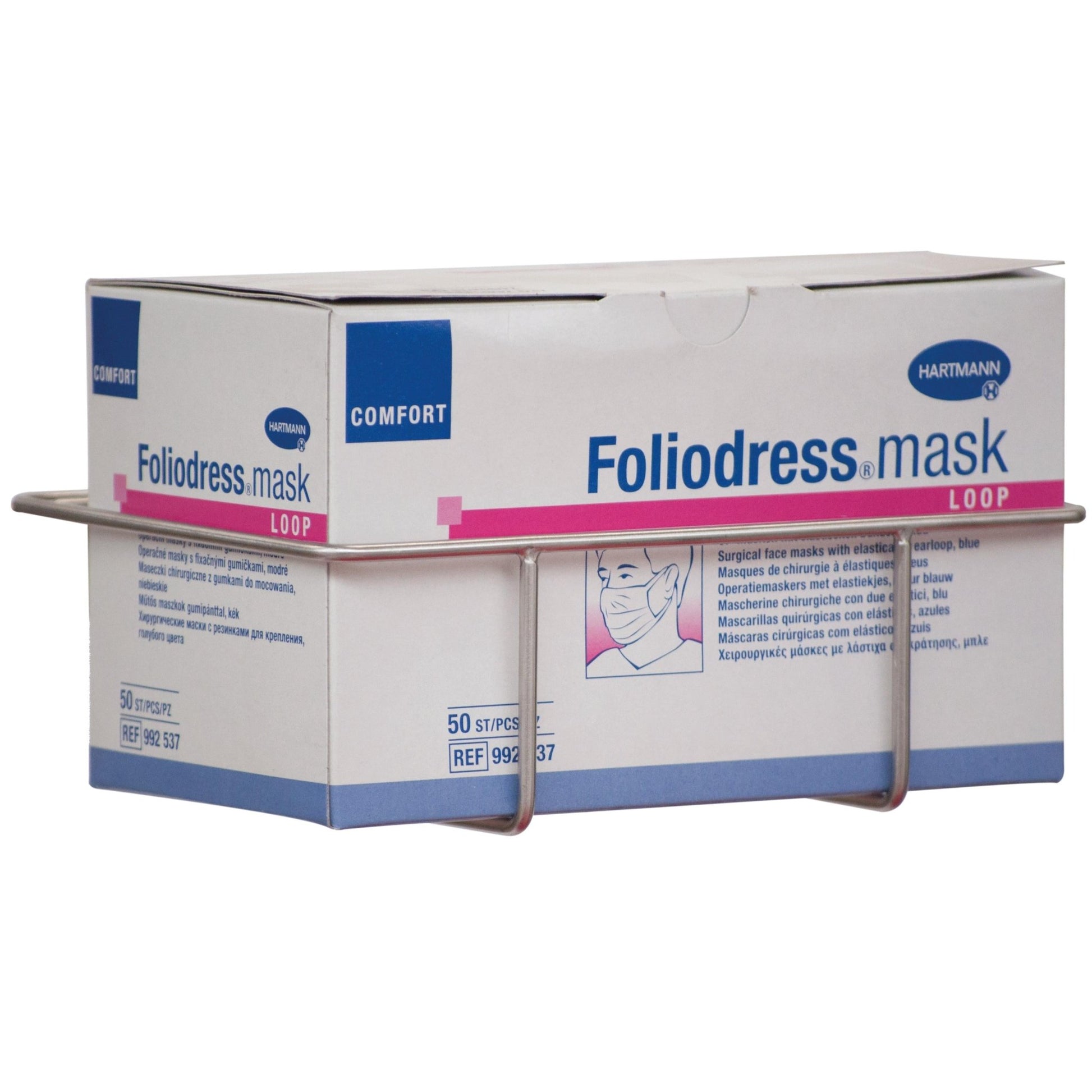 A Novocal stainless steel wall-mounted mask box holder (198 x 136 x 65 mm) holds a box "Foliodress mask LOOP" with 50 surgical masks, featuring text and a drawing of a masked person.