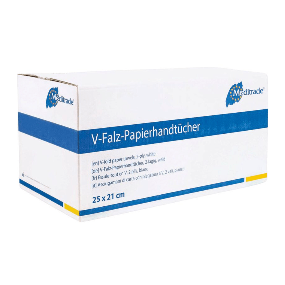 A white-blue box of Meditrade Folded Towels V-Fold from Meditrade GmbH, containing 15 packs of 2-ply white paper towels in the format 25 x 21 cm. The box is labeled in multiple languages and indicates its suitability for performing hand hygiene.
