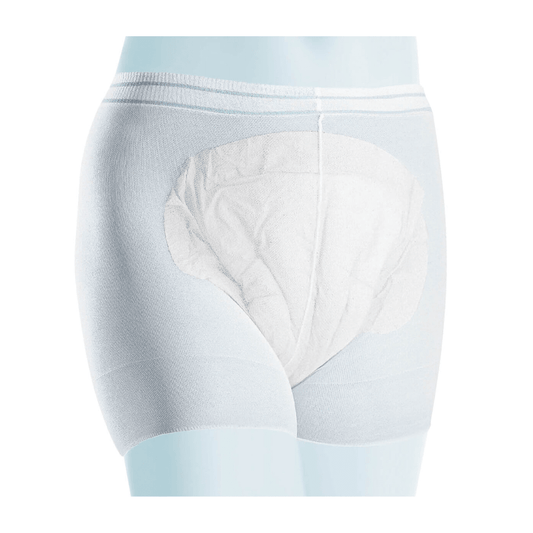 Close-up of a pair of light blue Meditrade Panty fixation briefs incontinence slips for adults. The padded area for absorbency is seen against a white background. These slips are part of the Meditrade Panty series.