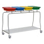 The Novocal stainless steel waste collector "Compact" four-way collector features a stainless steel frame, four colored containers (red, blue, yellow, green), a white base, and four castors for easy mobility.