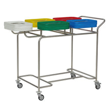 A space-saving solution: The Novocal stainless steel laundry collector "Kompakt plus" with five compartments and colored lids on wheels is ideal for sorting dirty laundry or waste.