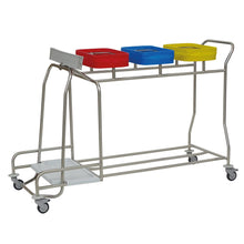 The Novocal stainless steel laundry collector "Compact plus" is a mobile 3-compartment combination collector with colored containers (red, blue, yellow) for hygienic laundry storage or waste separation - optimally organized and space-saving on wheels.