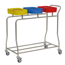 A space-saving solution: The Novocal stainless steel laundry collector "Compact plus" with three colored containers on wheels - ideal for sorting or collecting various items.