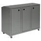 The Novocal recycling cabinet Series 3000 triple collector is a gray aluminum recycling cabinet with three compartments, each with a door and a round deposit hole. Four electrically conductive swivel castors ensure easy mobility.