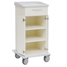The Novocal care and work cart has a white design with four wheels, an upper drawer with a handle, a lower cabinet with two open doors revealing adjustable shelves, and a sturdy solid plastic top.