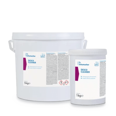 Pictured are two white containers of Dr. Schumacher DESCO CLEANER from Dr. Schumacher GmbH: a 5 kg bucket and a 1 kg cup, both with white lids and blue-purple labels with the inscription "Cleaner for all surfaces" for a streak-free result.