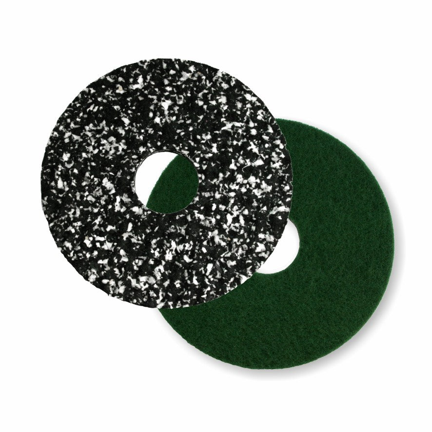 Two round Arcora PU-PAD floor pads from Arcora International GmbH—one black with white speckles, one green, both with a center hole—overlap on a white background, perfect for your floor polisher.