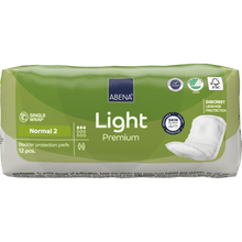 A pack of ABENA Light Normal 2, Premium from Abena Re-Seller GmbH (12 pieces) offers discreet leak protection and high absorbency. The green-white packaging shows product information and pictograms of the extended benefits.