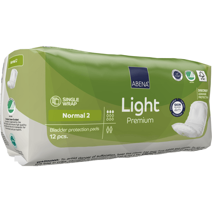 A green pack of ABENA Light Normal 2, Premium from Abena Re-Seller GmbH contains 12 pads. The packaging includes information on absorbency, key product advantages, and symbols for skin-friendliness and discreet protection.