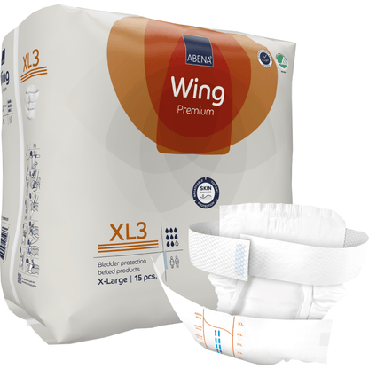 Pictured is a pack of ABENA Wing Premium from Abena Re-Seller GmbH, labeled for bladder protection and skin health, with an unfolded X-Large diaper in the foreground; the pack contains 15 pieces for protection and comfort.