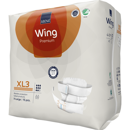 A pack of ABENA Wing Premium adult diapers from Abena Re-Seller GmbH (15 pieces) comes in a mostly white package with orange and brown accents, with ultimate protection and detailed size information.
