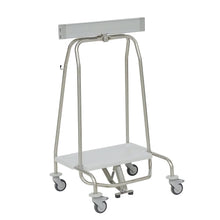 The Novocal waste collector "Genius" with clamping ring and pedal for 70-liter bags (Format: 57 | Pack of 1 piece) features four swivel casters, a flat white lower shelf, and an upper bar, shown on a white background.