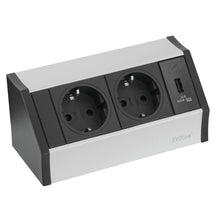 The Novocal Smart Power Outlet Allrounder features two grounded European sockets, a USB charging port, and a silver-black design with the "EVOline" logo on the lower right front. Includes H05 cable; 1 piece per package.