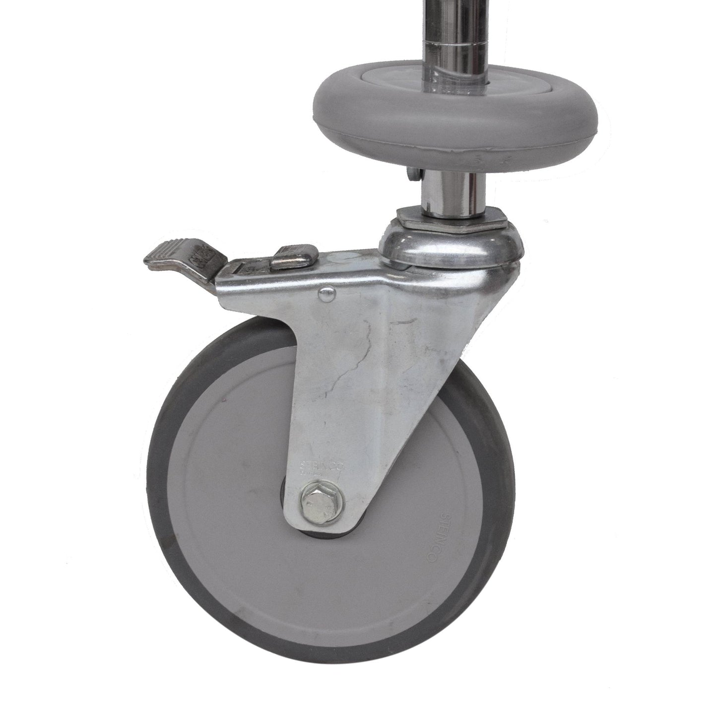 A gray steering wheel with Novocal shock discs (1 set = 4 pieces, 1 piece per package), metal bracket, and foot brake, attached to a metal rod - perfect as a sorting shelf trolley replacement from Novocal.