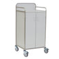 The Novocal station cart features a stainless steel frame with fully welded round tube connections, two cabinet doors, four gray casters, and metal railings, ideal for mobile storage and transport in hospitals or care facilities.