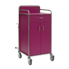 The Novocal station cart with a stainless steel frame, an upper drawer, two lower doors, and four swivel casters is ideal for hospitals. It is colored in violet, features fully welded round tube connections, and is depicted on a plain white background.