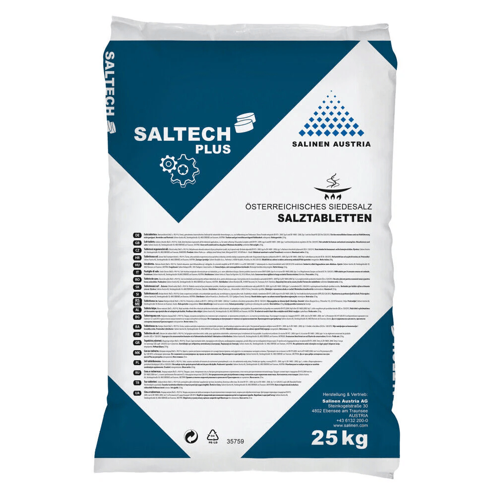 A white-blue 25 kg bag of "Saltech Plus Regenerating Salt Tablets" from Salinen Austria AG. The packaging displays the product name, brand, and detailed information about the water softening content in several languages.