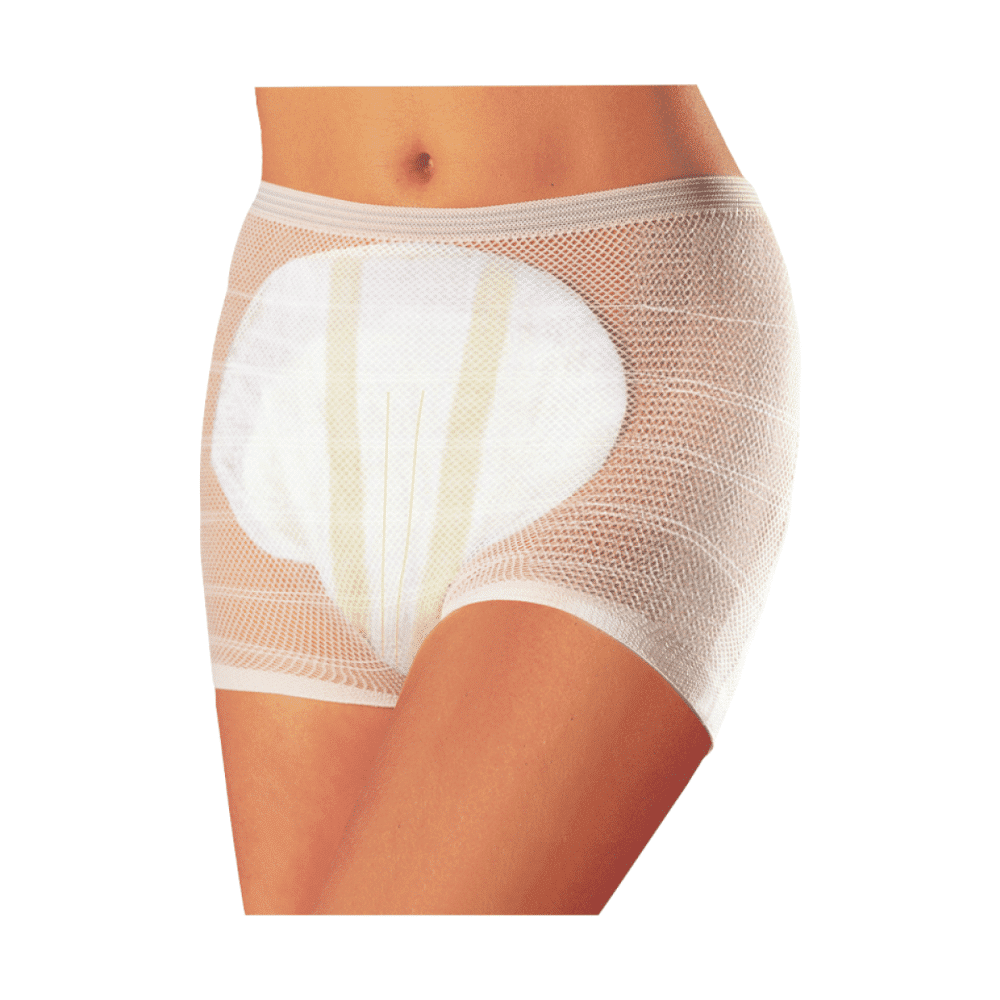 A close-up of a person wearing white Seni Fix Plus mesh pants, elastic fixation pants by TZMO Deutschland GmbH, with a large visible pad in the middle. Only the belly area and the upper thighs are visible.