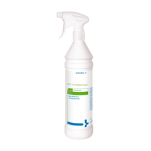 A white plastic spray bottle with the inscription "Schülke & Mayr GmbH" and green and blue text, indicating that it is a "Schülke Grill and Oven Cleaner | Bottle (1 l)", a strong alkaline cleaner for grills and ovens in the food industry. The bottle has a spray nozzle and a capacity of 1 liter.