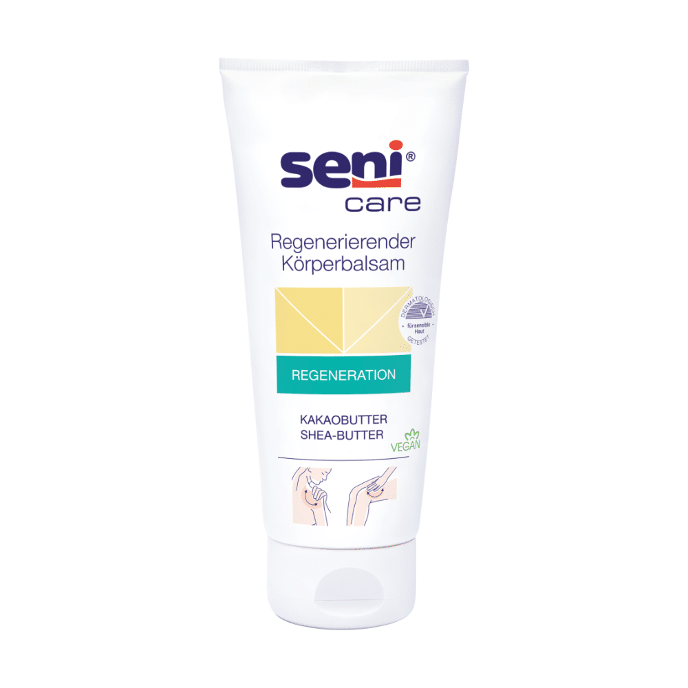 A white tube of Seni Care nourishing balm for dry skin (200 ml) from TZMO Deutschland GmbH with cocoa and shea butter, green “vegan” label, illustrated instructions below – provides intensive moisture for dry skin.