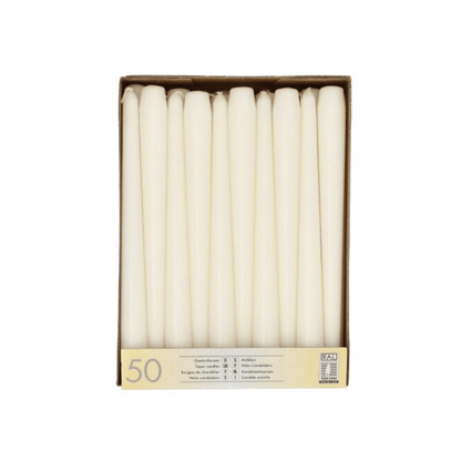 A box of 50 white taper candles from Starpak, neatly arranged in rows. The open box is labeled at the bottom, indicating the quantity and details in multiple languages and proudly bearing the RAL quality mark for quality assurance. These candles, known as "Starpak taper candles white Ø 2.2 cm · 25 cm," are packaged in a practical cardboard tray.