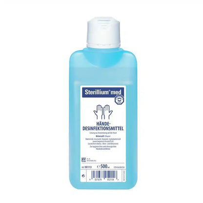 A bottle of Sterillium® med hand disinfectant with a flip-top cap and German label information. The label indicates its use as a 'hand disinfectant' and the bottle is manufactured by Paul Hartmann AG.