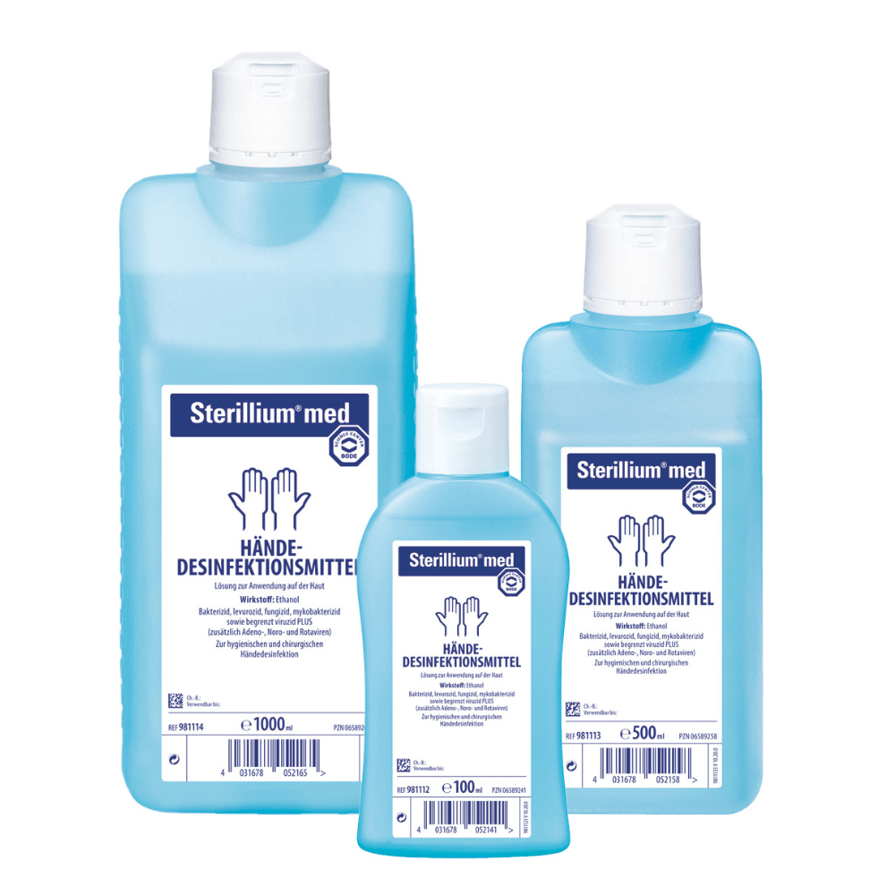 Three bottles of Sterillium® med hand disinfectant based on ethanol in different sizes with German labeling. The bottles are translucent blue with white caps and labels with medical symbols. The product is manufactured by Paul Hartmann AG.