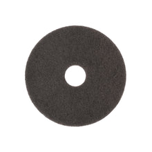 A round, flat, black Arcora Superpad Dark Brown dry base cleaning on insensitive coverings from Arcora International GmbH with a small hole in the middle is depicted on a white background.