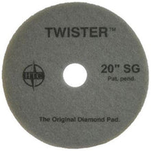 The Twister Pad 10000 from Diversey Deutschland GmbH & Co. OHG is a round, gray floor pad with a central hole and the imprint "TWISTER 20'' SG - The Original Diamond Pad". Ideal for cleaning and polishing hard floors.