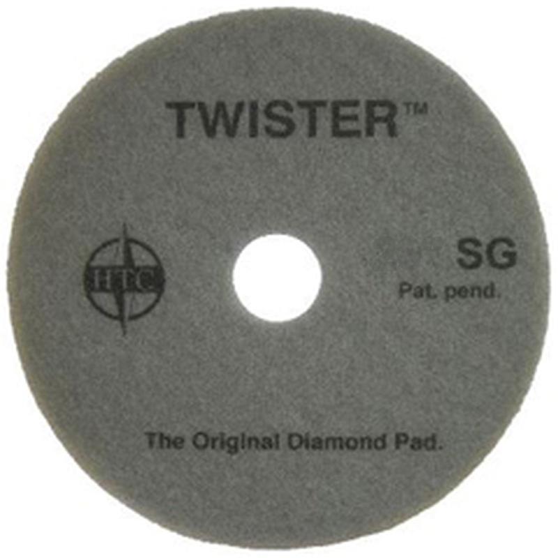 The Twister Pad 10000 from Diversey Deutschland GmbH & Co. OHG is a round, gray pad with a central hole, ideal for cleaning and polishing hard floors.