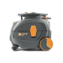 Side view of the sleek, gray-orange TASKI AERO 8 PLUS from Diversey Deutschland GmbH & Co. OHG, showcasing its large wheels and modern, compact design with whisper technology for quiet operation. This powerful and efficient quiet canister vacuum is expertly crafted for your cleaning needs.