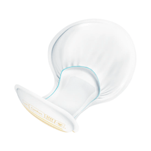 A white, curved TENA Comfort Normal incontinence pad from Essity Germany GmbH, adorned with orange symbols, is presented against a simple background. It is made from soft materials for increased comfort and features a smooth and ergonomic design that is perfect for leakage protection. This product offers reliable protection and peace of mind.