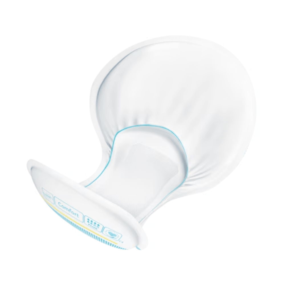 A dome-shaped object with a flexible design, featuring a softly padded interior and a smooth exterior surface. It highlights leak protection with a blue accent line as well as small blue symbols and text indicating features or instructions for the TENA Comfort Plus incontinence pad by TENA - Essity Germany GmbH, available in a pack of 46 pieces.