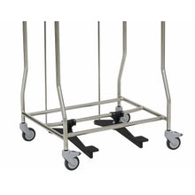 The Novocal Tretvorrrichtung | 1 piece from Novocal features a robust metal frame, four swivel casters, and two black foot pedals at the bottom for stable support and easy transport of items.