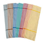 Six folded cloth napkins in gray, taupe, blue, petrol, pink, and yellow with a stripe are arranged on a white background next to the Novocal textile laundry bag self-opening (100% polyester, approx. 12 kg capacity) by Novocal.