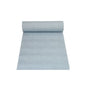 A roll of light blue fabric from the PAPSTAR table runner fabric-like PV-Tissue Mix "ROYAL Collection" of PAPSTAR GmbH is partially unrolled and elegantly presented on a white background. The pulp-viscose-tissue mix gives it a smooth and evenly colored appearance.