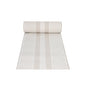 A roll from the fabric-like table runner PV-tissue mix "ROYAL Collection" of PAPSTAR GmbH in beige, adorned with a stripe and geometric diamond pattern, is partially unrolled, showcasing its elegant design. The pulp-viscose tissue mix material adds a touch of sophistication to the plain white background.