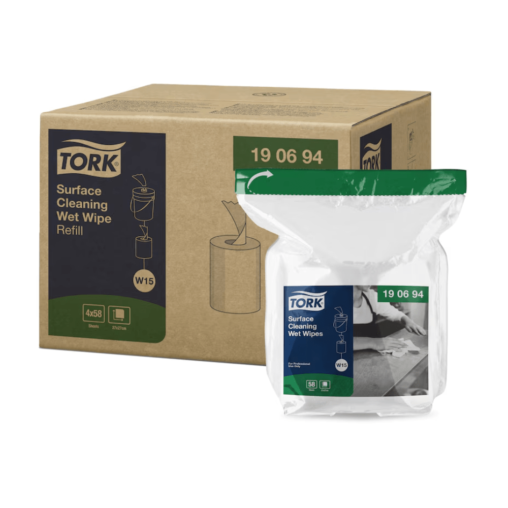 Packaging for Tork 190694 refill material for moist surface cleaning cloths Premium W15 1-ply. A cardboard box with the Tork logo and product details is delivered along with a transparent plastic packaging containing the moist wipes, ideal for efficient cleaning. The image also includes a depiction of the product in use.
