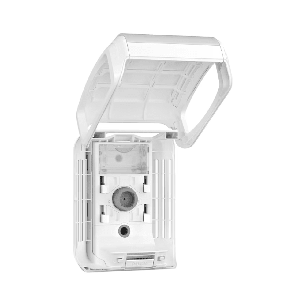 A Tork 256010 dispenser for continuous air freshener, designed by TORK – Essity Professional Hygiene Germany GmbH, stands against a white background. This outdoor outlet features a single socket and an open protective cover with a transparent lid to ensure safety in exposed environments, and seamlessly integrates into continuous air freshening systems.
