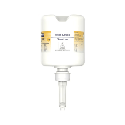 A Tork 420202 hand lotion dispenser in white with a transparent nozzle and the inscription "Sensitive Moisturizing Hand Sanitizer" in small print offers a minimalist design that focuses on dispensing moisturizing lotion, perfect for caring for sensitive skin.