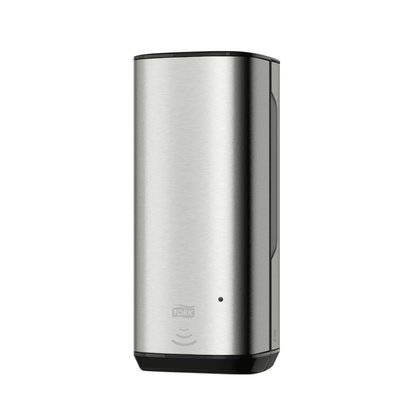 We present the Tork 460009 Skincare Dispenser with Intuition Sensor from the Image Line S4. This dispenser features an elegant, modern design with a stainless steel surface and an advanced Intuition Sensor. It has a practical sensor display on the front and a black base, making it ideal for commercial and private environments. Presented by TORK, part of Essity Professional Hygiene Germany GmbH.
