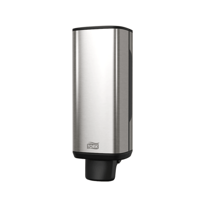 The Tork 460010 dispenser for soap and hand sanitizers from TORK – Essity Professional Hygiene Germany GmbH features a sleek, rectangular stainless steel design with a refined black nozzle at the bottom and the "Tork" logo near the base. Its modern aesthetic stands out beautifully against a white background, making it perfect for dispensing soap and hand sanitizers.