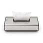 We present the Tork 460013 dispenser for cosmetic tissues Image Line F1 from Essity Professional Hygiene Germany GmbH. This elegant silver tissue dispenser features a modern rectangular design with a stainless steel design finish. It has a single sheet dispensing function, allowing a white tissue to be partially pulled out from the top opening, and its minimalist appearance makes it ideal for cosmetic tissues.