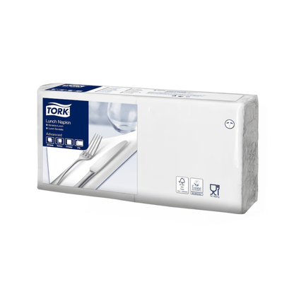 A pack of Tork 477149 Lunch Napkins is shown. The predominantly white packaging contains a blue label with product information and an image of a fork, knife, and napkin. Additionally, symbols are visible that highlight the two-layer construction and the eco-friendliness of the packaging.